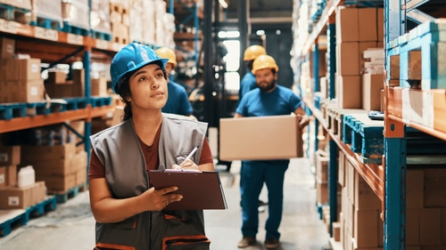 Recall InfoLink responder with a clipboard in a warehouse